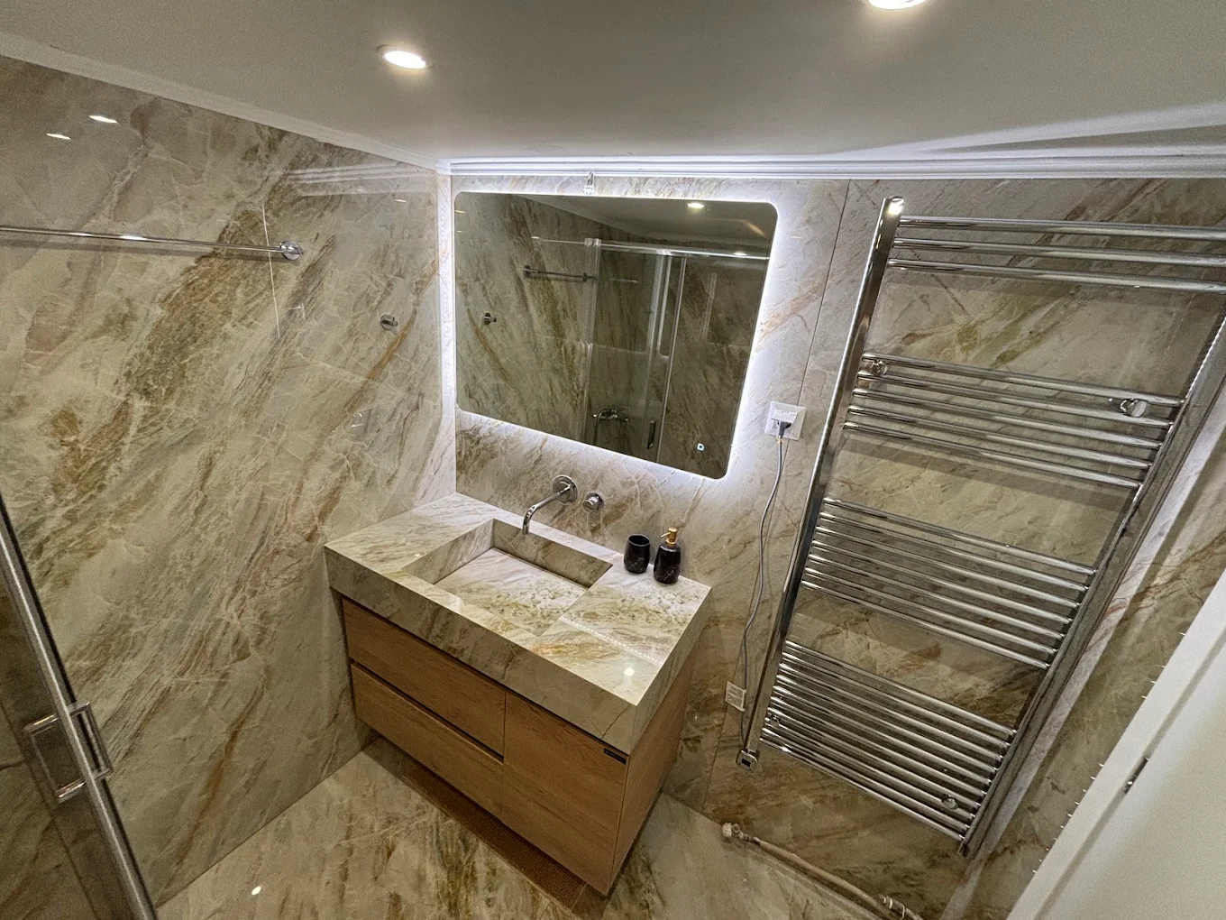 A bathroom fully clad in natural stone